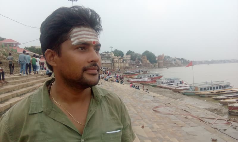 Sarvesh Mishra in his reporter years, on assignment at the Varanasi ghats